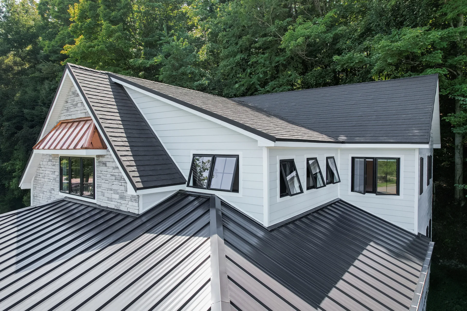 Home exterior with several windows open
